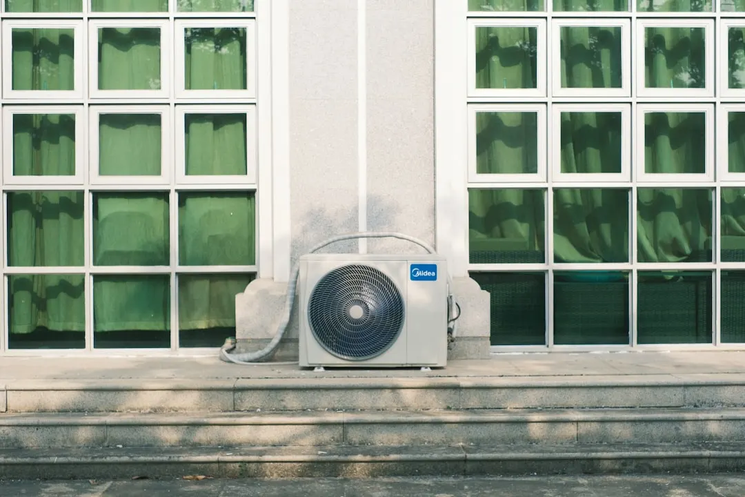 Residential outdoor AC unit installed at a Edmonton home