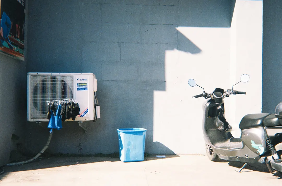 AC tune-up service on residential outdoor unit in Edmonton