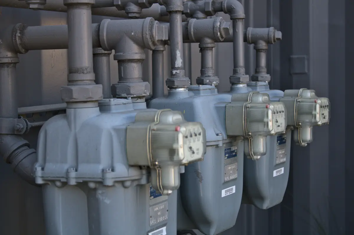 Pool heater installation with gas piping in a Edmonton backyard