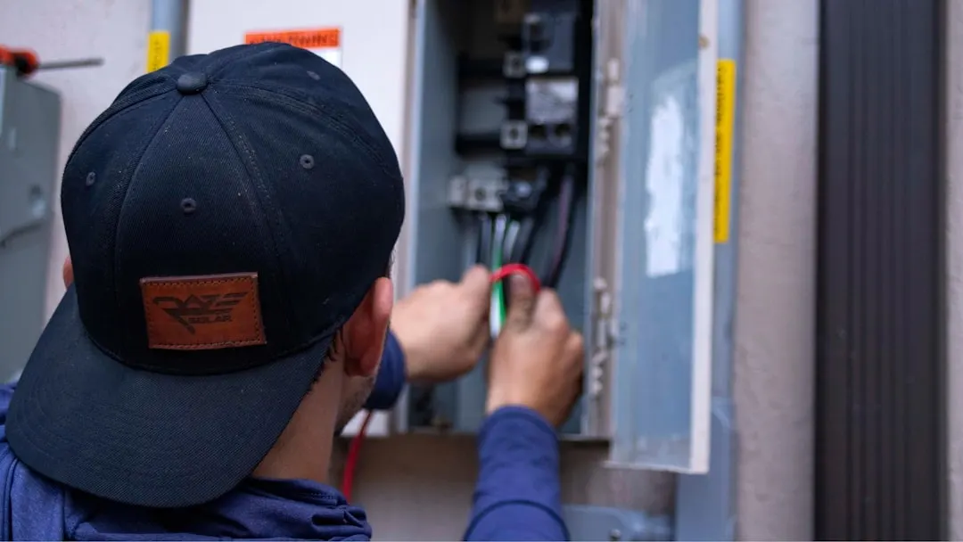 Edmonton Heating and Cooling technician installing a high-efficiency furnace