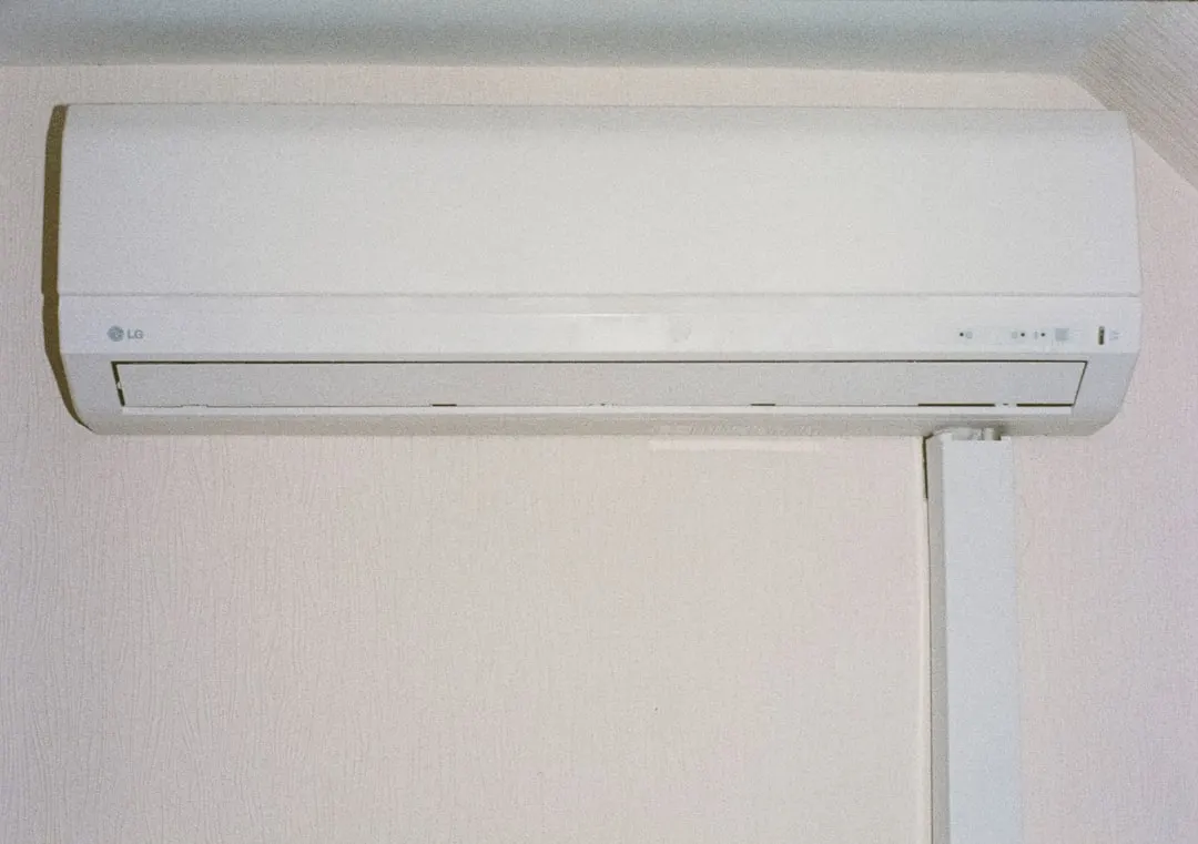 Wall-mounted ductless mini-split indoor unit in a Edmonton living room