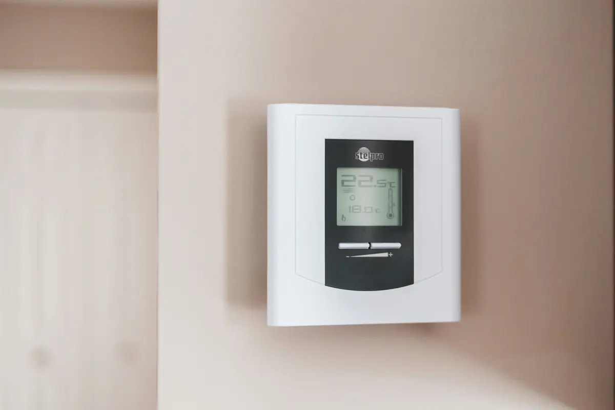 Smart thermostat installed on wall in a Edmonton home