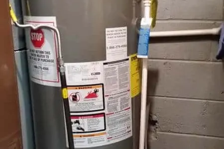 Water heater tank service in a Edmonton basement